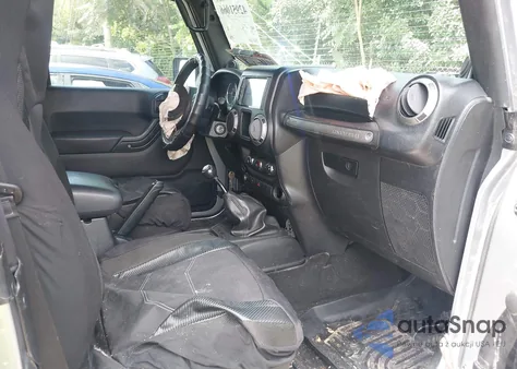 2013 Jeep Wrangler Sport z USA, uszkodzony, nr VIN 1C4AJWAG2DL648315